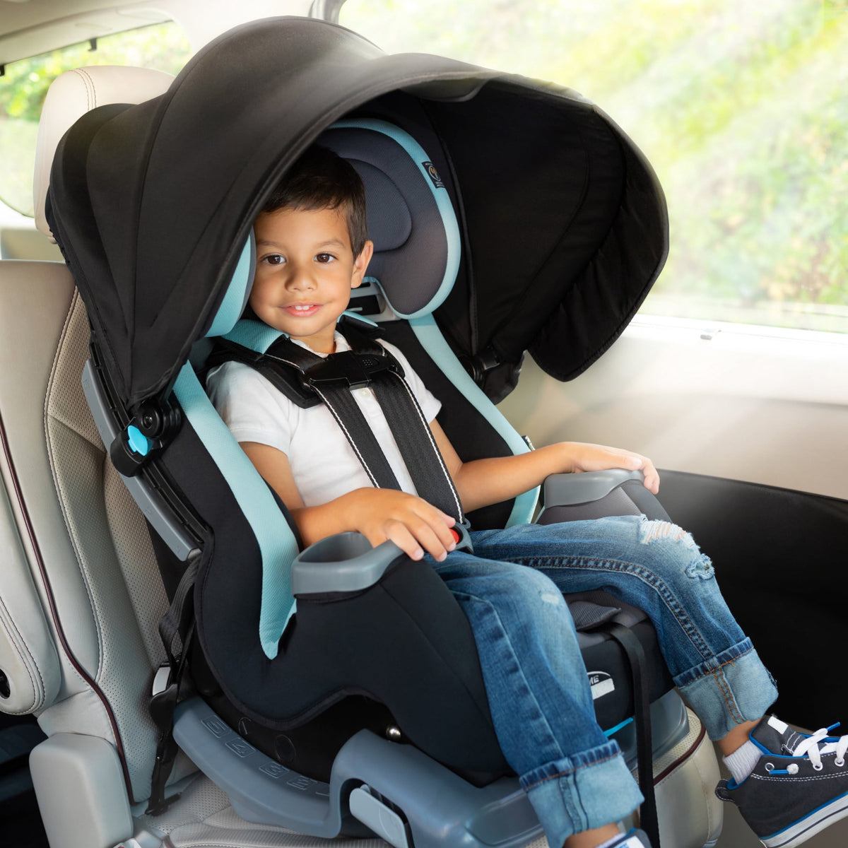 Toddler in the car seat with the canopy