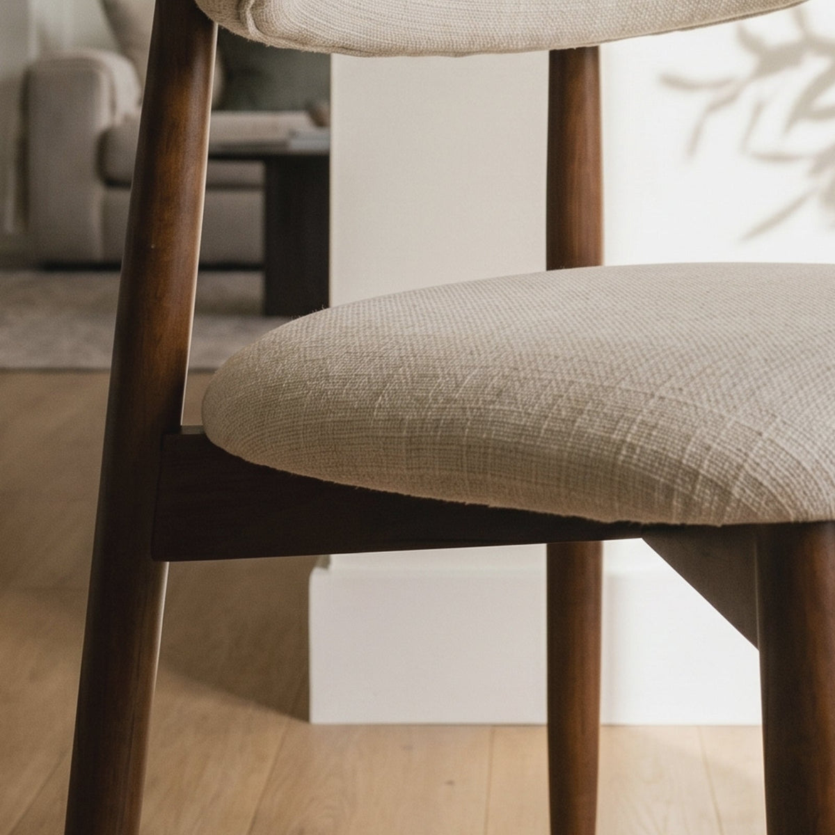 Detail of the fabric seat and wood frame