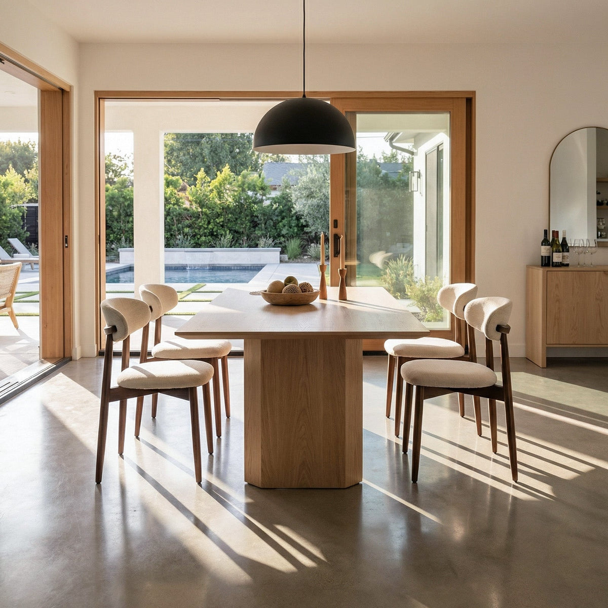 Beige dining chairs in a bright dining room